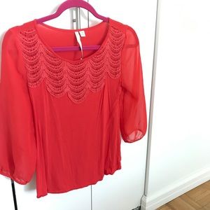 Lauren Conrad red top with sheer sleeves